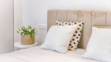 1 bedroom, desk, iron/ironing board, travel crib