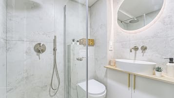 Hair dryer, towels, soap, shampoo