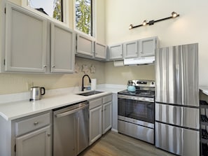Fridge, dishwasher, coffee/tea maker, toaster