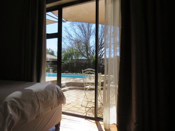 Family Twin Room, Pool View | Terrace/patio