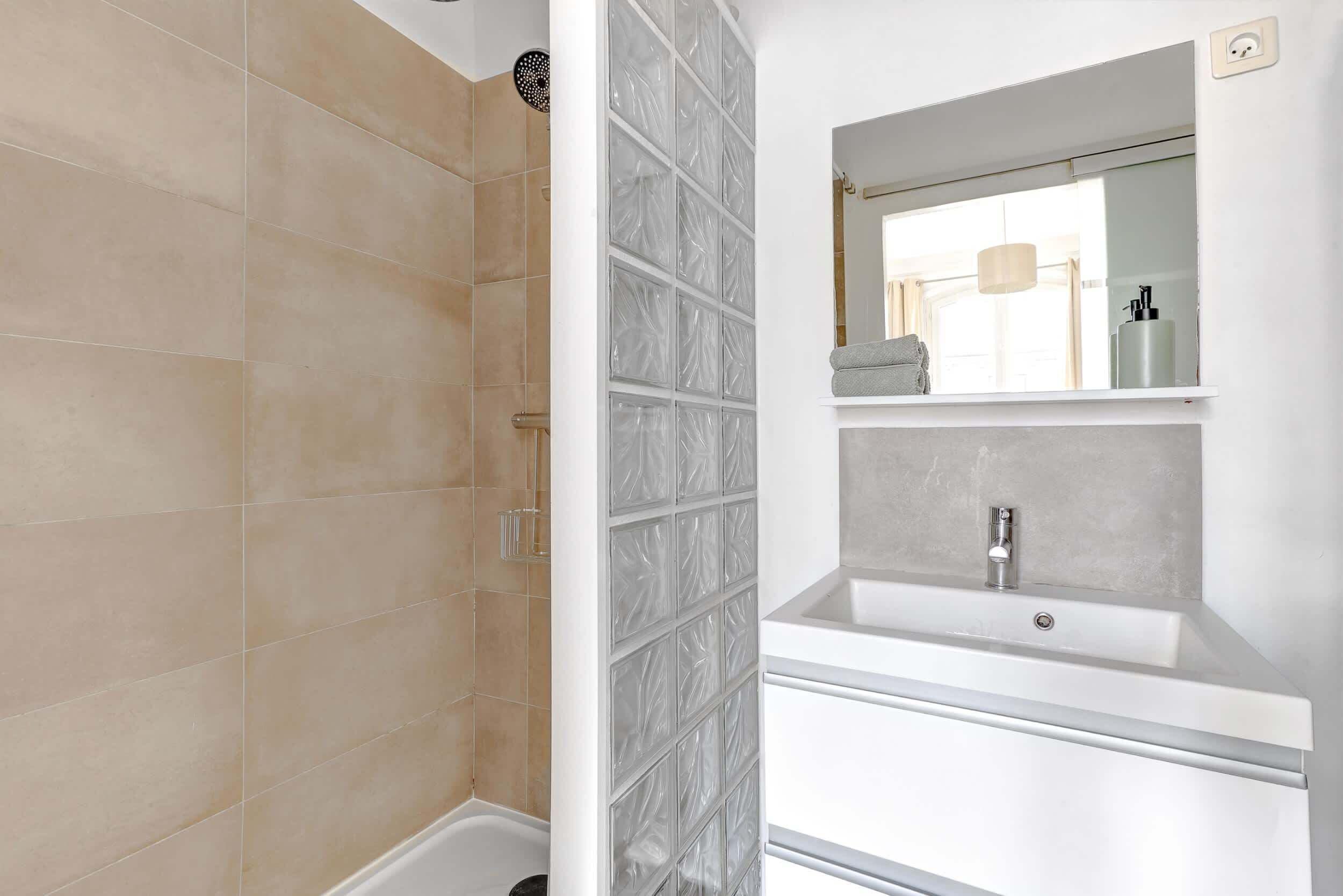 Shower, hair dryer, towels