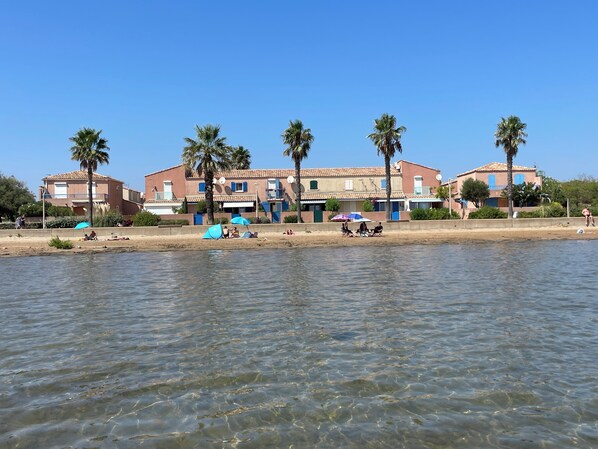 On the beach, sun loungers