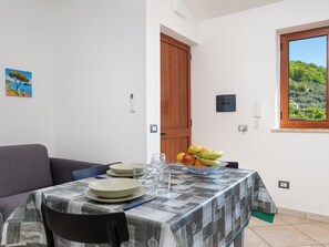 Appartement panoramique, vue sur la mer | Salle à manger