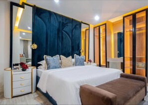 1 bedroom, desk, laptop workspace