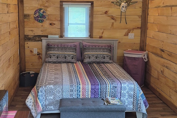 inside cabin 1 queen comfy bed.