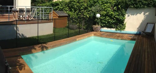 Family home with heated pool.