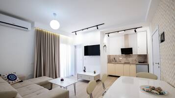 Deluxe Apartment, Balcony, Partial Sea View | Private kitchenette | Fridge