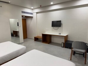 Superior Triple Room | Desk, laptop workspace, soundproofing, iron/ironing board - Hotel Madhukta Inn (Somnath)