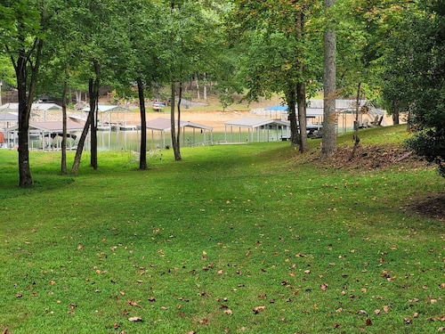 Lakefront on Nottely! Family retreat on single level with covered boat slip.