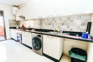 Family Apartment, Balcony, City View | Private kitchen
