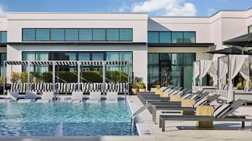 Outdoor pool, open 8:00 AM to 10:00 PM, free pool cabanas