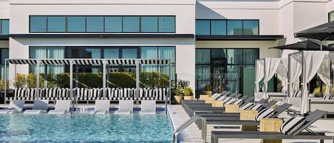 Outdoor pool, open 8:00 AM to 10:00 PM, free cabanas, pool umbrellas
