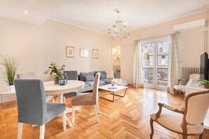 Family Apartment, 2 Bedrooms, Balcony | Living area | 40-inch TV with digital channels