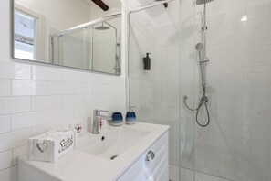 Hair dryer, bidet, towels, soap