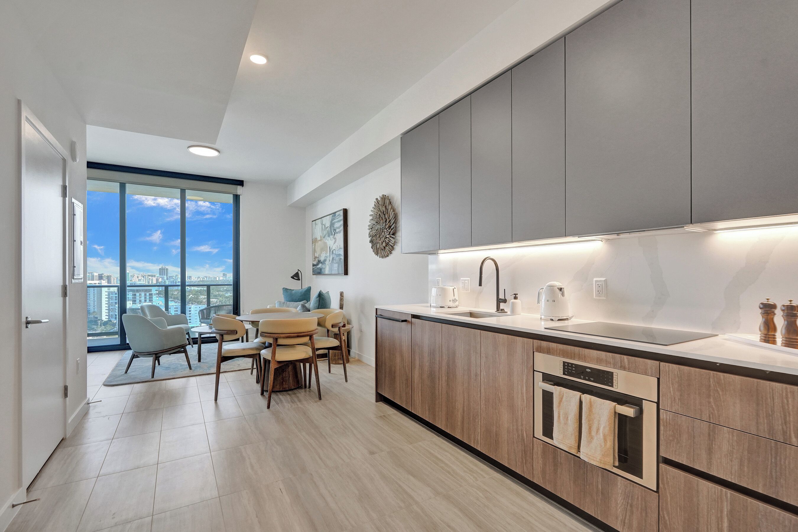 Luxury 1 Bedroom with Balcony, Partial Ocean views | Private kitchen | Fridge, microwave, oven, stovetop