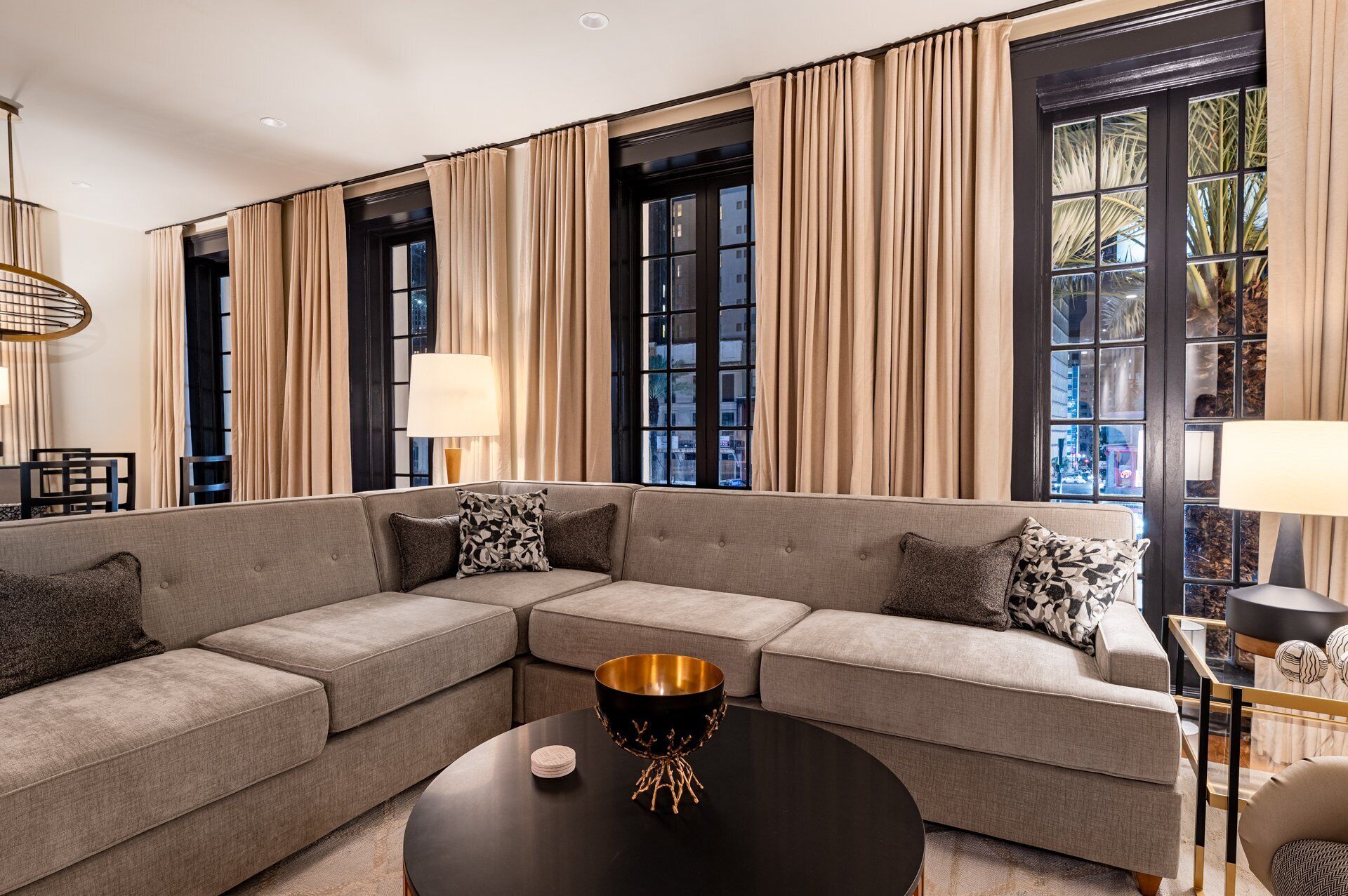 3BR City Views: Walk to French Qtr | The Mayfair | Living area | 65-inch Smart TV with cable channels, Netflix, Hulu