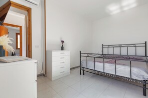 2 habitaciones, tabla de planchar con plancha y internet 