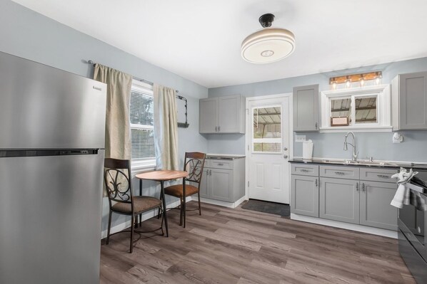 Fridge, microwave, stovetop, coffee/tea maker