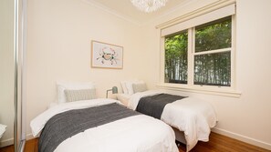 4 bedrooms, desk, iron/ironing board, travel cot