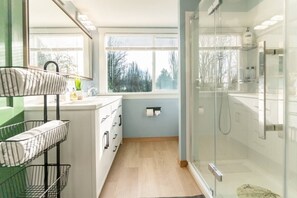 Shower, towels, soap, toilet paper