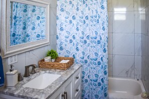 Hair dryer, towels, soap, shampoo