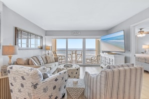 Relax in a comfortable seating area with a scenic ocean view.