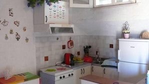 Cobertura básico, vista para o mar | Cozinha privada