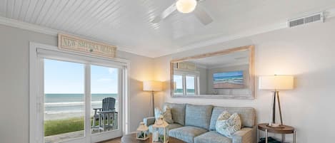 Condo, Multiple Beds (Sea Coast Gardens II 101) | Living area | TV