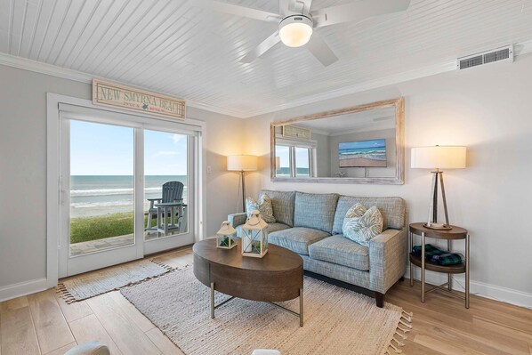Condo, Multiple Beds (Sea Coast Gardens II 101) | Living area | TV - Sea Coast Gardens II 101 (New Smyrna Beach)