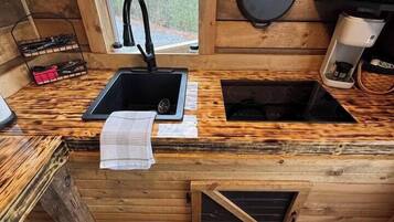 Fridge, microwave, stovetop, coffee/tea maker