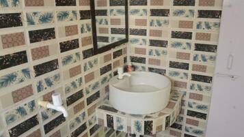 Shower, free toiletries, towels, soap
