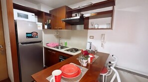 Microwave, oven, dishwasher, electric kettle - 
Céntrico y Cómodo – Torre Entel (Santiago)