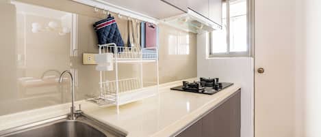 Fridge, microwave, stovetop, coffee/tea maker
