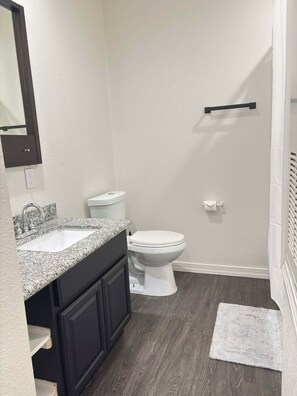 Hair dryer, towels, soap, toilet paper