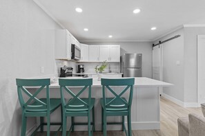 Condo, 1 Queen Bed with Sofa bed (Flagler Suites 1) | Private kitchen | Oven - Flagler Suites 1 (New Smyrna Beach)