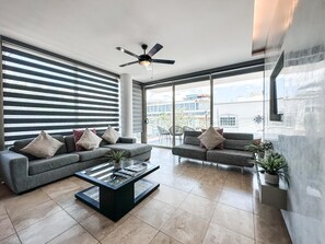 Apartment, Multiple Beds (DCA03 Trendy Condo in Mamita's beach ) | Living area - Dca03 Trendy Condo in Mamita's Beach Area-1/2 Block to 5th (Playa del Carmen)