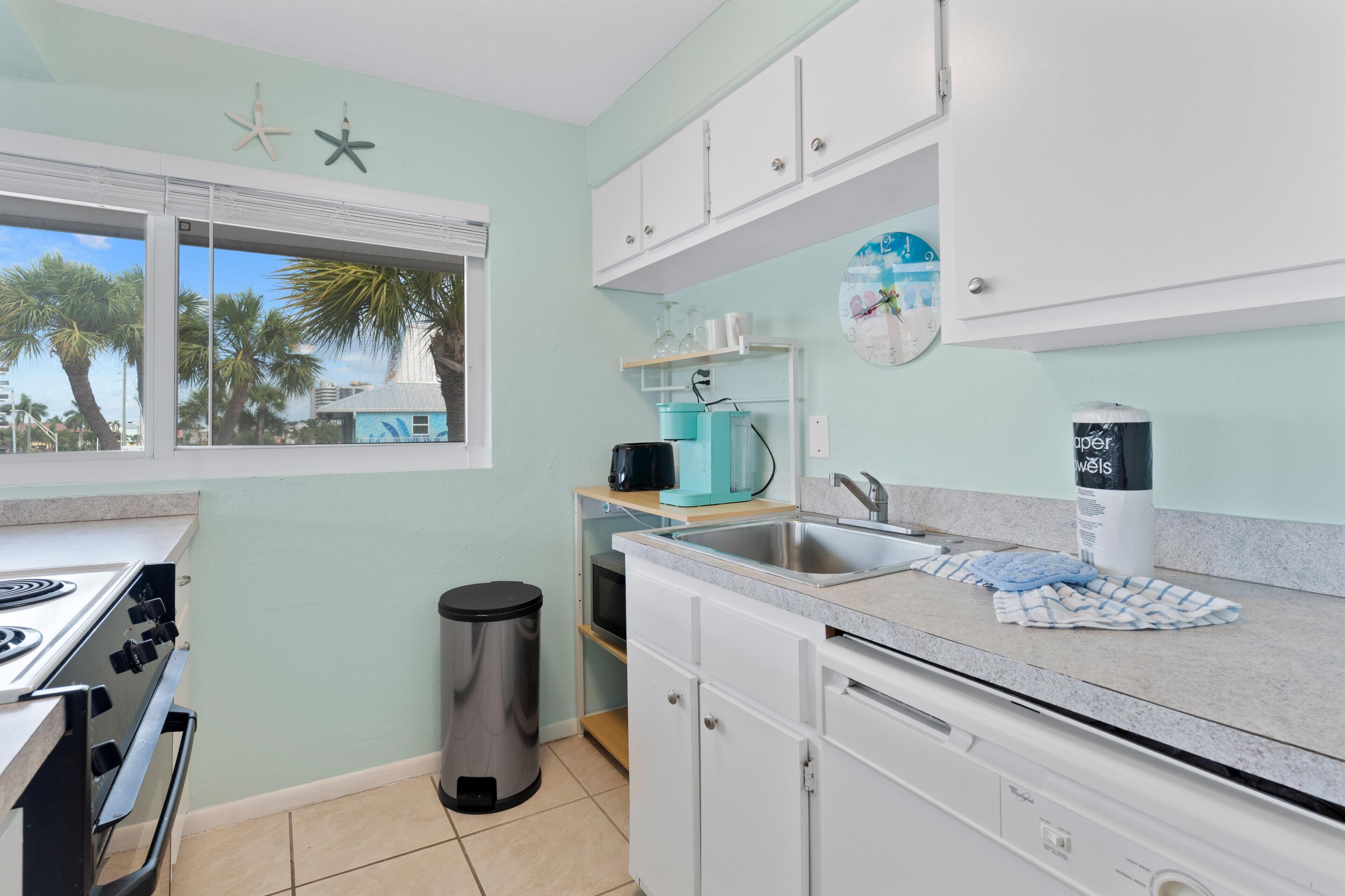 Condo, 1 King Bed with Sofa bed (Crescent Shore 201) | Private kitchen | Oven, toaster