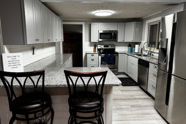 Full kitchen is equipped with everything you need to make a home cooked meal
