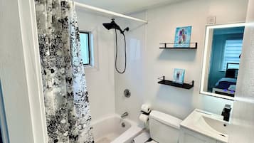 Hair dryer, towels, soap, shampoo