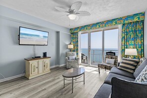 Condo, Multiple Beds (Ocean Walk Resort 1707) | Living area | TV
