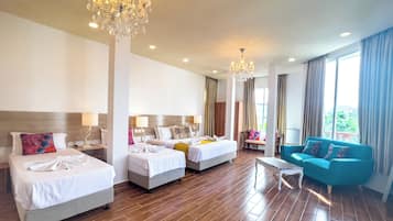 Family Quadruple Room, Balcony, City View | In-room safe, free WiFi