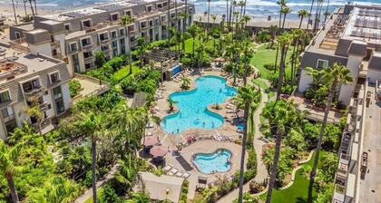 Steps to the Sand: Sleek, coastal beach condo