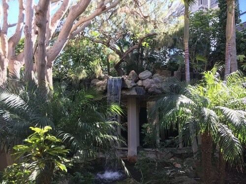 Steps to the Sand: Sleek, coastal beach condo