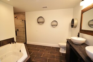 Shower, jetted bath, towels