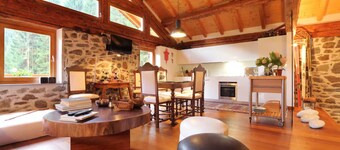 Unique chalet in the green Trentino, with sauna and private forest, ideal for relaxation.
