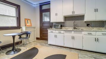 Fridge, microwave, stovetop, coffee/tea maker