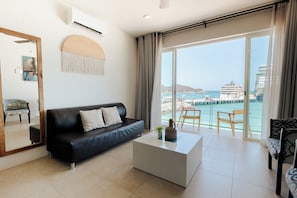 Suite, 2 Double Beds, Ocean View | Living area | 32-inch Smart TV with digital channels