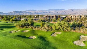 A golf course with bunkers and a building complex in the background. - Ultimate Family Getaway Awaits at The Westin Desert Willow Villas – 2 BD Lockoff (Palm Desert)