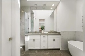Shower, towels, soap, toilet paper