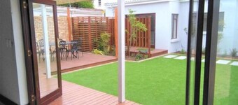 Spacious 4BR En-Suite Home – 5 Min to the Beach & Airport | Free WiFi & Parking